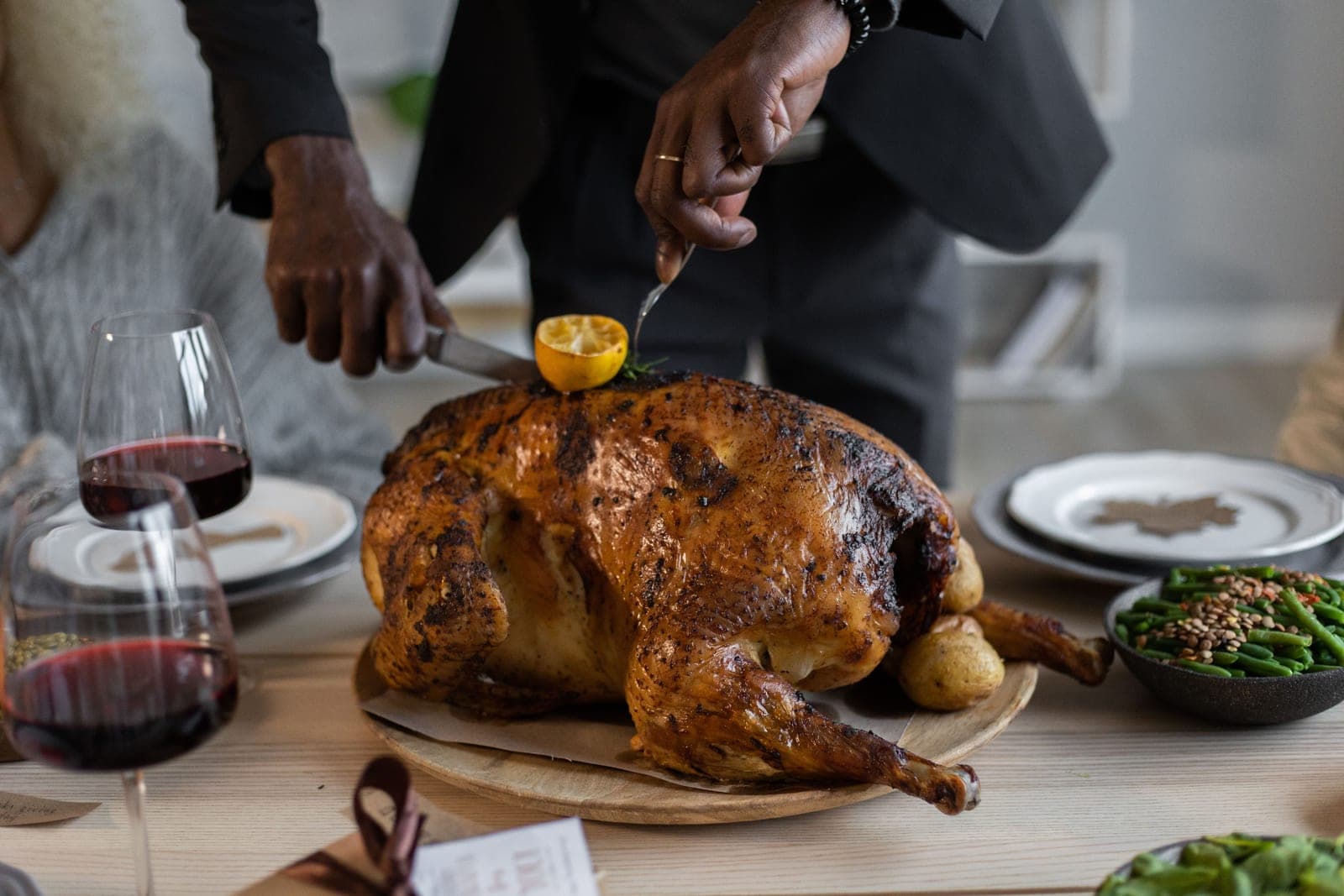 A holiday dinner table set for guests