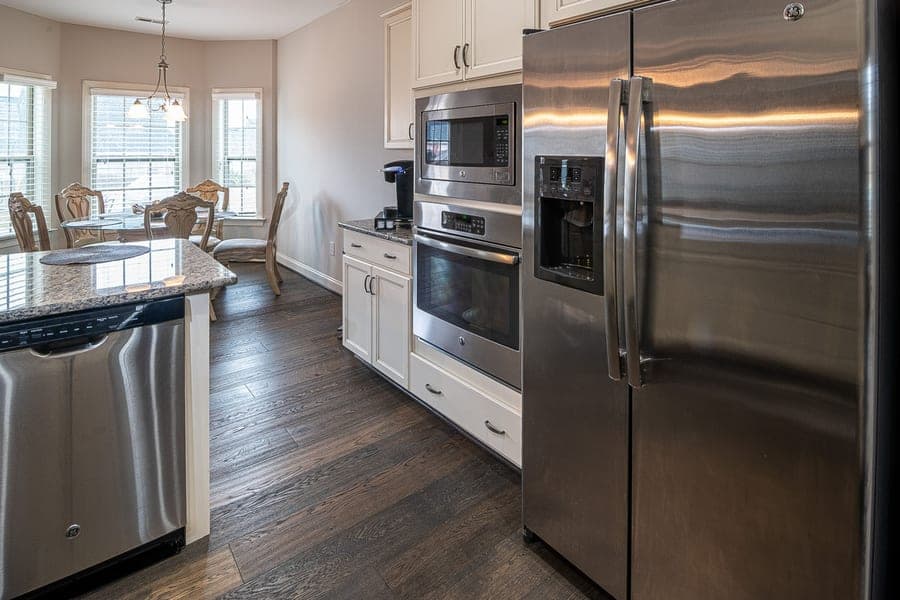 A stainless steel countertop cooking appliance in a home kitchen